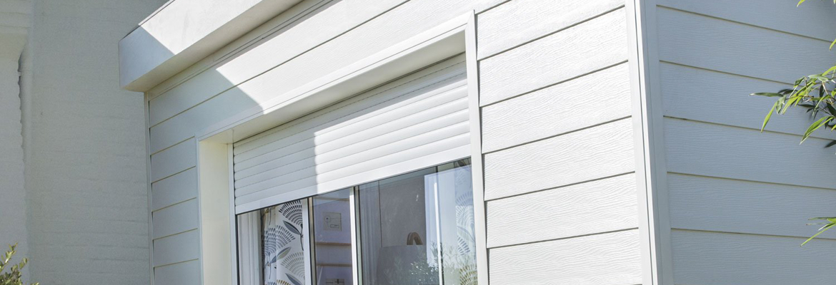 Installer une baie vitrée coulssante avec volet roulant aluminium à la place d'une porte de garage