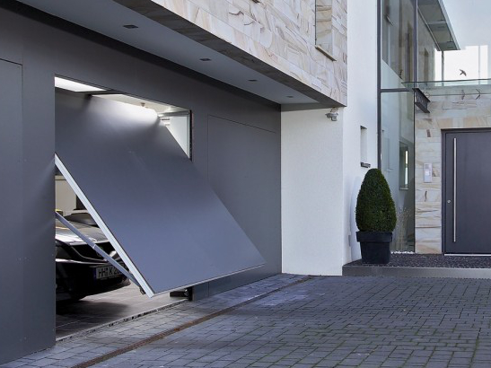 Porte de garage basculante / débordante / en acier / avec